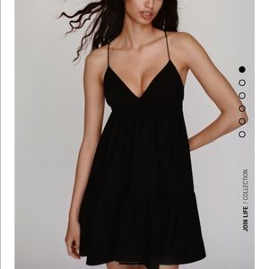 Flowy tiered spaghetti strap little black dress